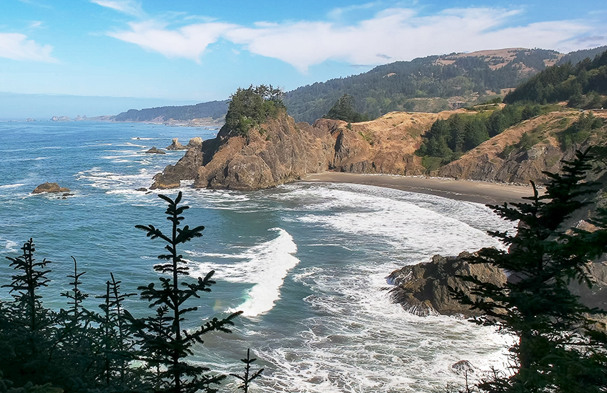 A cheap beach vacation destination is Gold Beach in Oregon