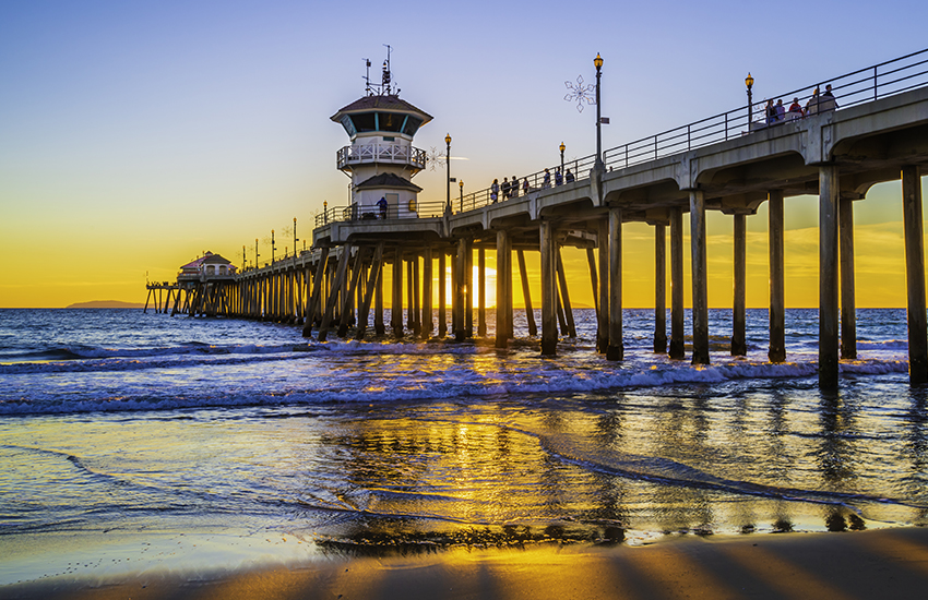 Where to travel for a beach vacation on a budget is Huntington Beach in California